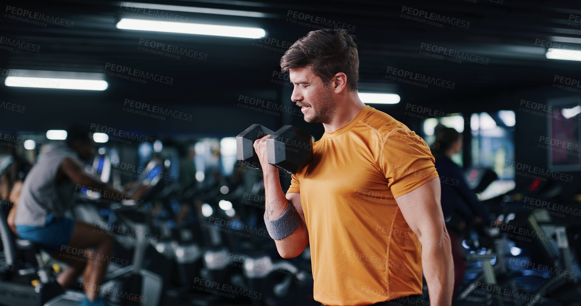 Buy stock photo Fitness, space and weights with man in gym for bodybuilding, strength training or workout routine. Dumbbell, exercise and progress with bodybuilder person in health club for physical challenge
