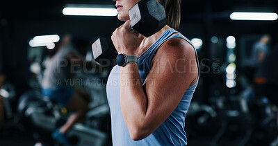 Buy stock photo Fitness, bodybuilder or arm in center with dumbbell, power or bicep curl in weightlifting routine. Exercise, bokeh or woman in gym with equipment, intense workout or strength in muscle transformation