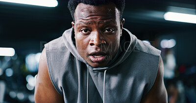 Buy stock photo Portrait, fatigue and black man breathing for fitness, wellness and recovery from intense exercise. Sweat, tired and person in workout club for rest, health break and challenge with bokeh in gym
