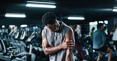 Buy stock photo Man, fitness and arm pain with injury in gym for muscle tension, accident or emergency. Active, male person or sore bicep with ache or strain for joint inflammation or discomfort in health club