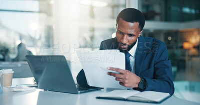 Buy stock photo Investor, laptop and black man with documents, reading and checklist for company audit. African person, trading strategy and financial advisor in office, pc and research for stock market and planning