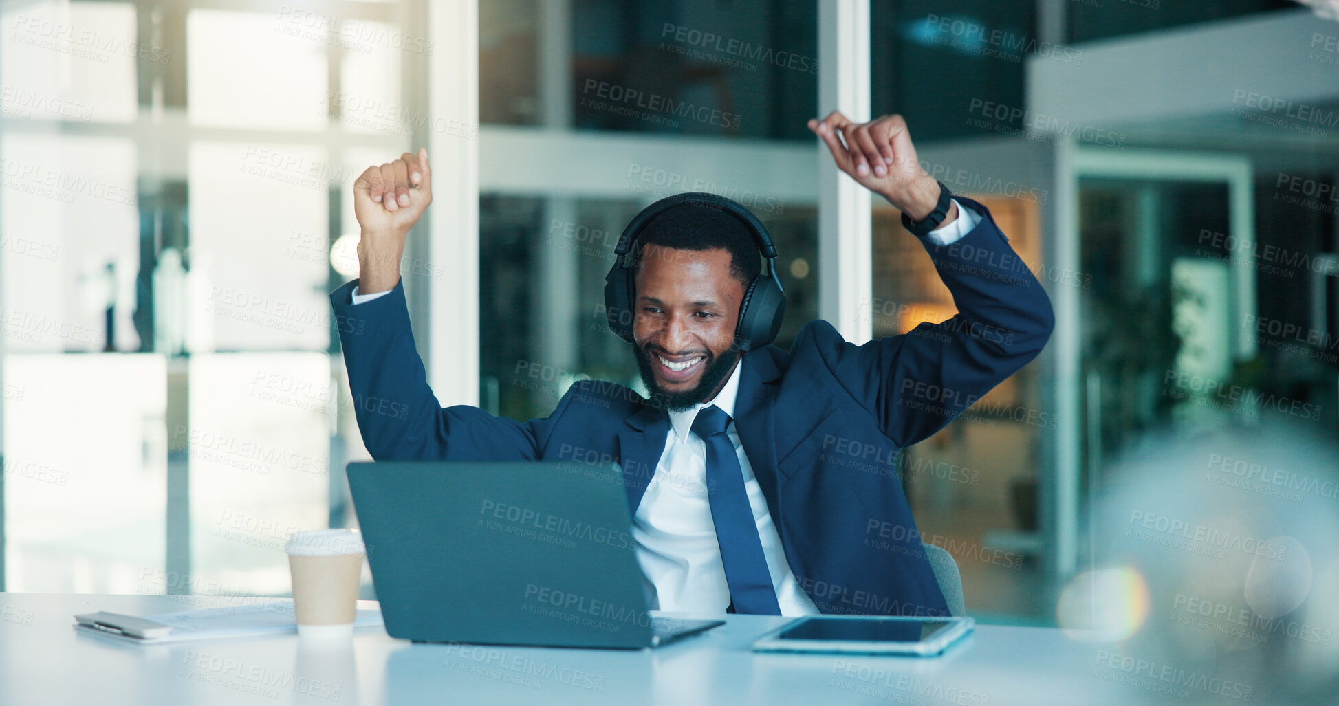 Buy stock photo Investor, celebration and black man with laptop, headphones and email for profit growth. African person, financial advisor and employee in office, pc and success for stock market, promotion and bonus