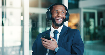 Buy stock photo Financial advisor, cellphone and black man with headphones, smile and laughing. African person, funny podcast and happy investor with smartphone, humor and streaming music with digital app for radio