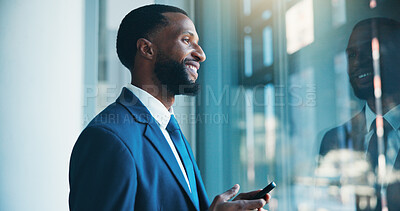 Buy stock photo Financial advisor, cellphone and black man with smile, thinking or decision for investment. African person, window or investor in office, smartphone or email for profit growth, solution or reflection