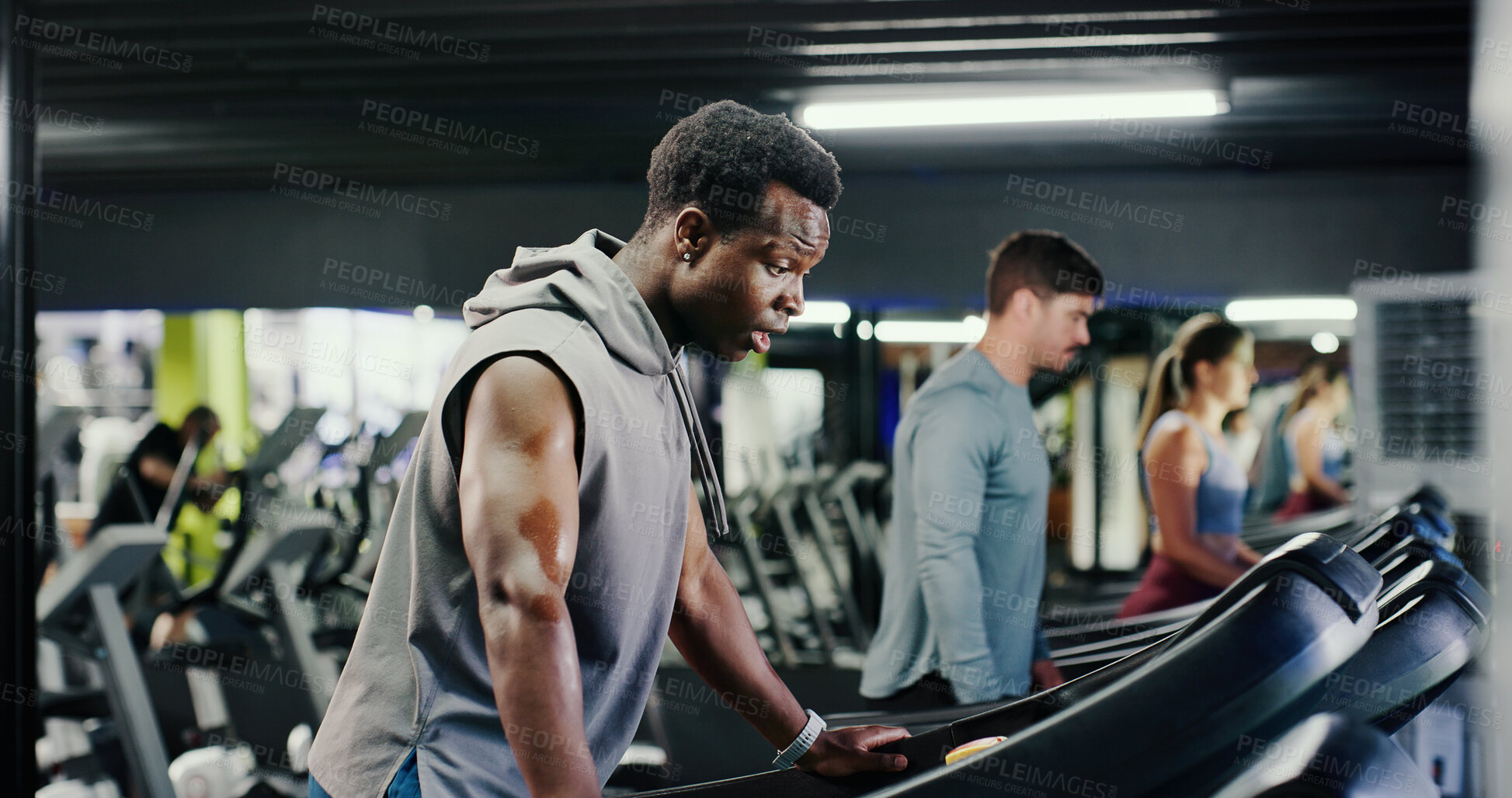 Buy stock photo Tired, workout break or man on treadmill, training and endurance for wellness in gym to rest. Cardio machine, runner or exhausted person in exercise club with fatigue, breathing or fitness for health
