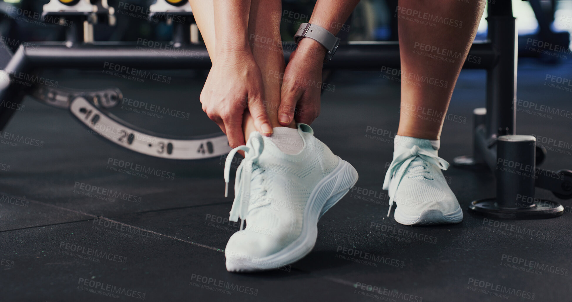 Buy stock photo Ankle pain, fitness and hands with person in gym for training accident or workout mistake. Burnout, discomfort and foot injury with woman in health club for condition, fatigue or inflammation