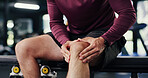 Emergency, fitness and knee pain with man in gym for training accident or workout mistake. Burnout, exercise and joint injury with person in health club for condition, fatigue or inflammation