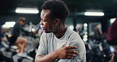Buy stock photo Exercise, fitness and shoulder pain with man in gym for training accident or workout mistake. Arm injury, burnout and discomfort with sore person in health club for fatigue or joint inflammation