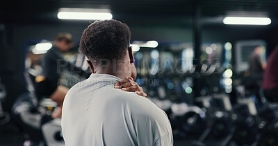 Buy stock photo Emergency, fitness and neck pain with man in gym for training accident or workout mistake. Back injury, discomfort and space with person in health club for condition, fatigue or inflammation