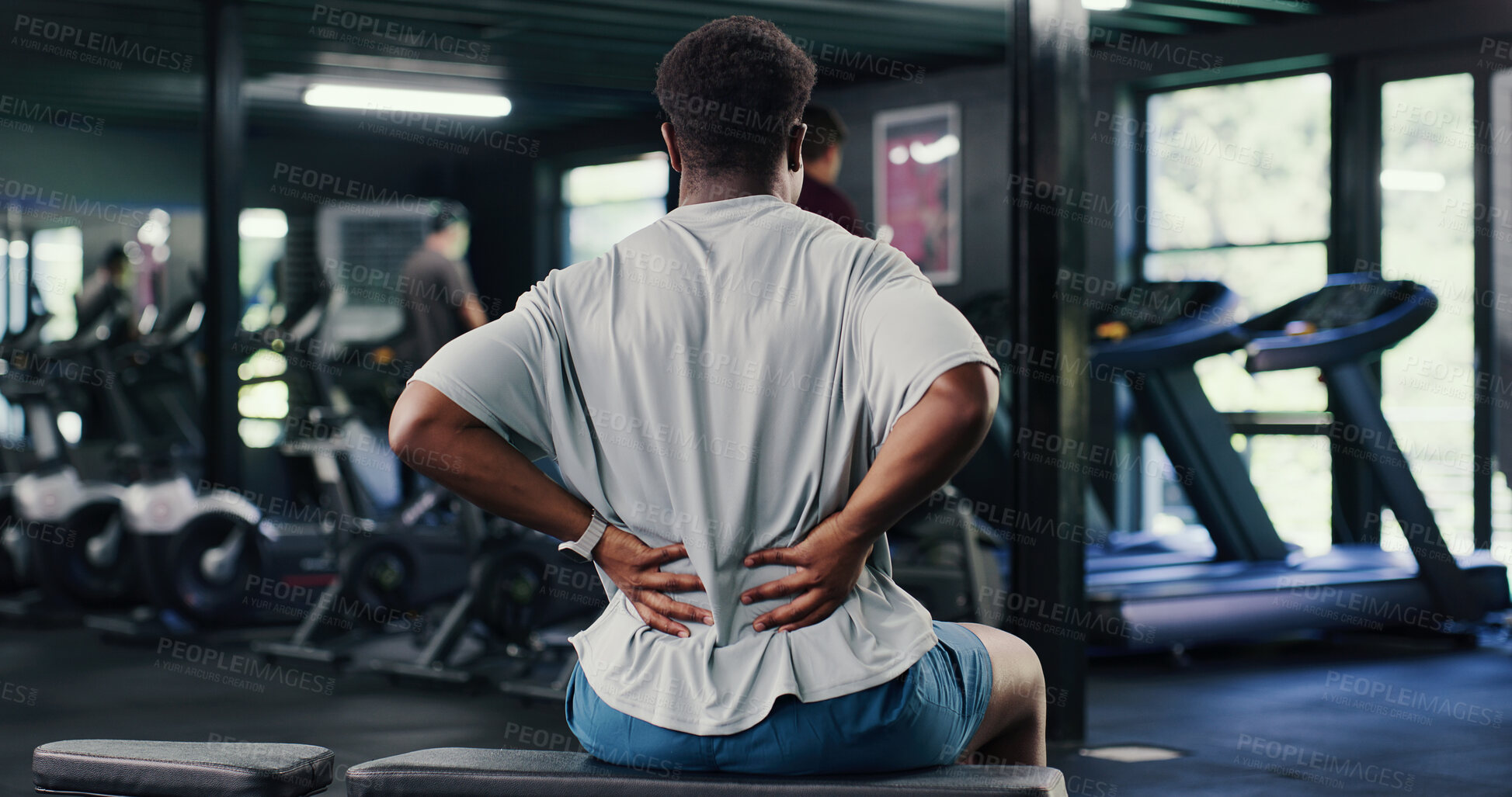 Buy stock photo Back pain, burnout and fitness with man in gym for training accident or workout mistake. Discomfort, exercise and spine injury with person in health club for condition, fatigue or inflammation