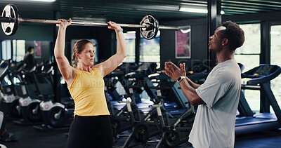 Buy stock photo Fitness, personal trainer or woman with barbell in gym, strength challenge or coaching for body goals. Strong, instructor or people with weightlifting exercise for muscle gain, explain form or active