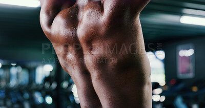 Buy stock photo Back, sweat and weightlifting with shirtless man in gym for strength training or workout routine. Bodybuilding, exercise and fitness with person in health club for challenge or physical improvement