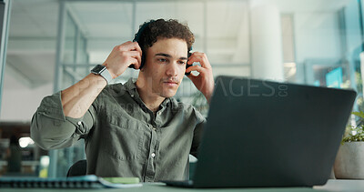 Buy stock photo Headphones, laptop and businessman in office with playlist for creative project with research. Computer, audio tech and male magazine editor with music for article with publishing in workplace.