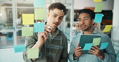 Buy stock photo Writing, tablet and business men in meeting for brainstorming, planning or project agenda. Creative office, glass board and people on digital tech for research, schedule or seo review on sticky notes