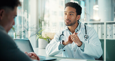 Buy stock photo Men, doctor and explain with advice at hospital, listen and laptop for wellness report in consultation room. People, medical professional and patient with discussion for healthcare in clinic office