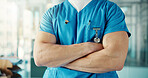 Man, hands and doctor with confidence in hospital for healthcare service or medical help. Closeup, male person or professional health worker with arms crossed for nursing management in care clinic