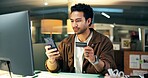 Business man, credit card and phone in office for online shopping, digital purchase and transaction. Electronic payment, fintech and employee with mobile for ecommerce, checkout process and banking