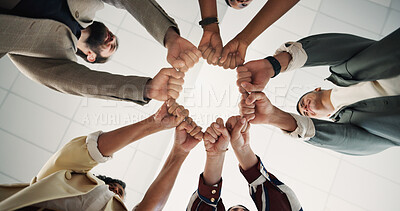 Buy stock photo Hands, fist bump and team in circle at office, celebration or support for motivation at insurance company. Business people, group and synergy in low angle with success, goals or achievement at agency