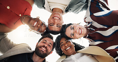 Buy stock photo Huddle, portrait and smile of friends outdoor together for bonding or unity from below. Hug, sky and trust with group of happy people in circle for celebration, motivation or support as community