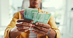 Hands, money and man in office, counting and finance management with economic growth. Closeup, entrepreneur and person in workplace, budget control and cash for startup, payment or investment funding