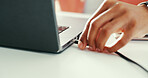 Hands, person and charge laptop with cable to transfer data, download app and internet access. Employee, port and pc for programming software, system update and backup for troubleshooting maintenance