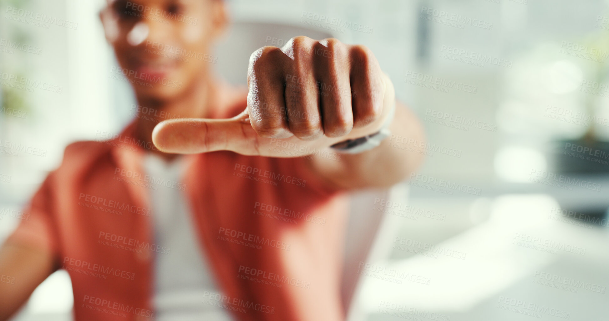Buy stock photo Creative, hand gesture and employee in office, opinion and side thumb for neutral vote and undecided. Business, finger and person with sign for uncertain choice, doubtful and feedback for work