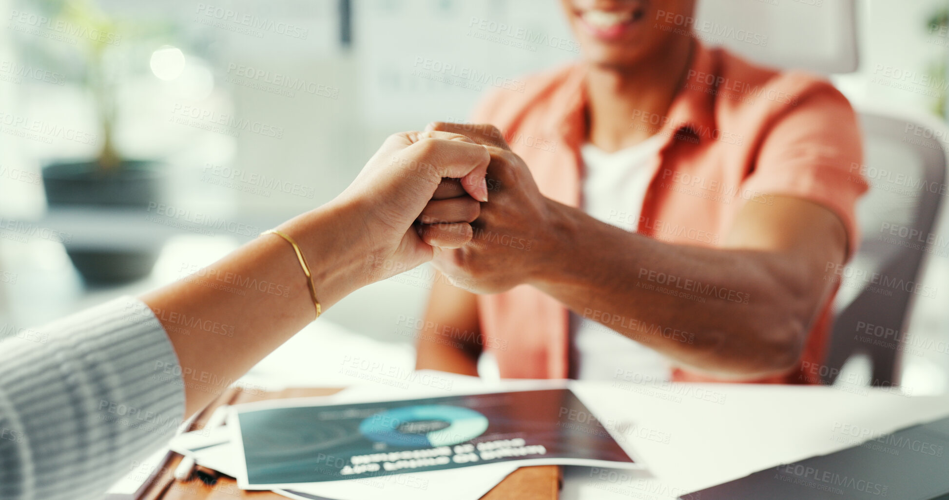 Buy stock photo Hands, fist bump and team with success at startup, documents and motivation with smile at office. People, celebration and thanks with paperwork, charts and achievement with goal at creative agency