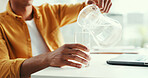 Man, hands and pouring water in office with laptop, glass jug and healthy drink for hydration on break. Thirsty person, computer and liquid in workplace for wellness, refreshing beverage or minerals.