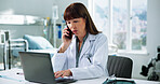 Doctor, laptop and phone call with woman in hospital for medical files, communication and researcher. Healthcare, surgery schedule and telehealth appointment with person in clinic for online contact