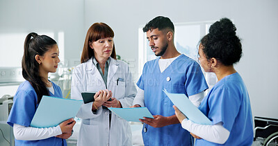 Buy stock photo Doctor, nurses and document with tablet in clinic for training, research and teamwork or management. Healthcare professionals, people and mentor with digital tech for internship, schedule or meeting