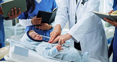 Buy stock photo Hands, nurses and doctor with CPR training on baby doll for medical simulation, life saving or notes. People, health interns or expert with mannequin in clinic for infant chest compressions or skills