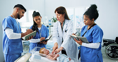 Buy stock photo Doctor, nurses and baby CPR on mannequin for medical simulation, demonstration or learning notes. People, health interns and pediatrician with doll in clinic for infant chest compressions and rescue