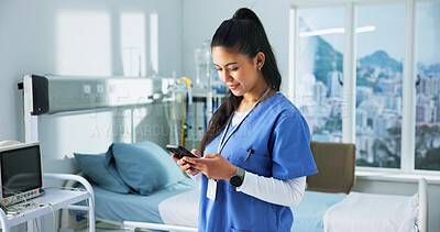 Buy stock photo Nurse, online and woman with phone in hospital for clinic schedule, notification and communication. Healthcare, typing and person on smartphone for email, medical research and contact on mobile app