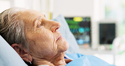 Buy stock photo Thinking, sad and elderly woman in hospital bed for healing, recovery and worry for surgery. Healthcare, thoughtful and senior patient resting for operation, diagnosis and treatment for wellness