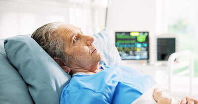 Buy stock photo Thinking, sad and senior woman in hospital bed for healing, recovery and worry for surgery. Healthcare, thoughtful and elderly patient resting for operation, diagnosis and treatment for wellness