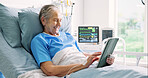 Senior woman, happy and tablet in hospital bed, scroll and streaming service for recovery, movie or video. Elderly person, tech and relax with application, ebook or subscription for healing at clinic