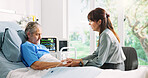 Old woman, daughter and holding hands in hospital bed for visit, support and comfort for recovery. Senior patient, person and empathy for illness, medical services or healthcare operation for healing