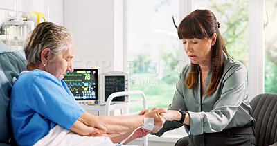 Buy stock photo Old woman, daughter and holding hands in hospital bed for visit, support and praying for recovery. Senior patient, person and faith with compassion, medical services and healthcare belief for healing