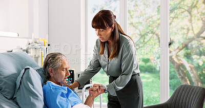 Buy stock photo Senior woman, daughter and holding hands in hospital bed for visit, support and comfort for recovery. Elderly patient, person and empathy for chronic illness, medical services or healthcare operation