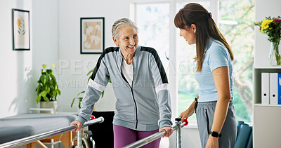 Buy stock photo Happy woman, elderly patient or physiotherapist with walker rail for balance or stability in clinic. Senior, female person or health physio with assistance for muscle recovery or movement in practice