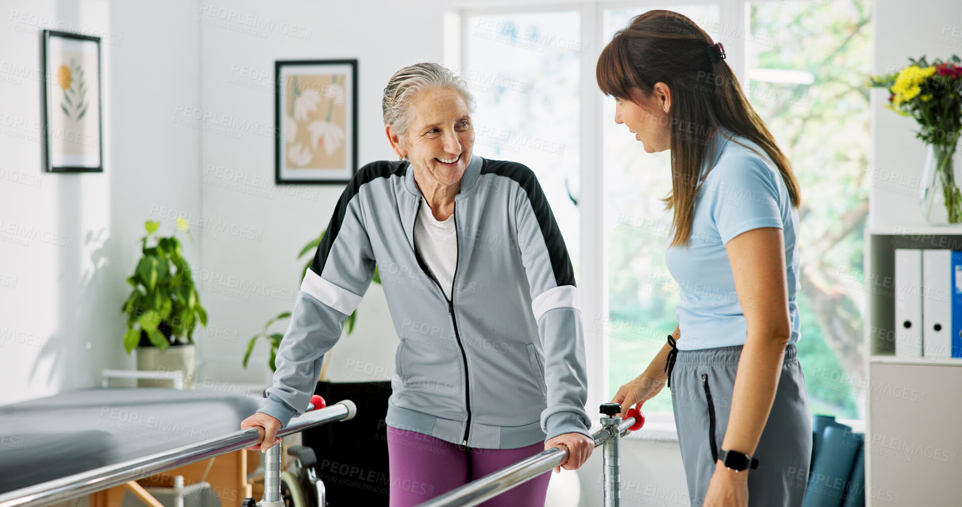 Buy stock photo Happy woman, elderly patient or physiotherapist with walker rail for balance or stability in clinic. Senior, female person or health physio with assistance for muscle recovery or movement in practice
