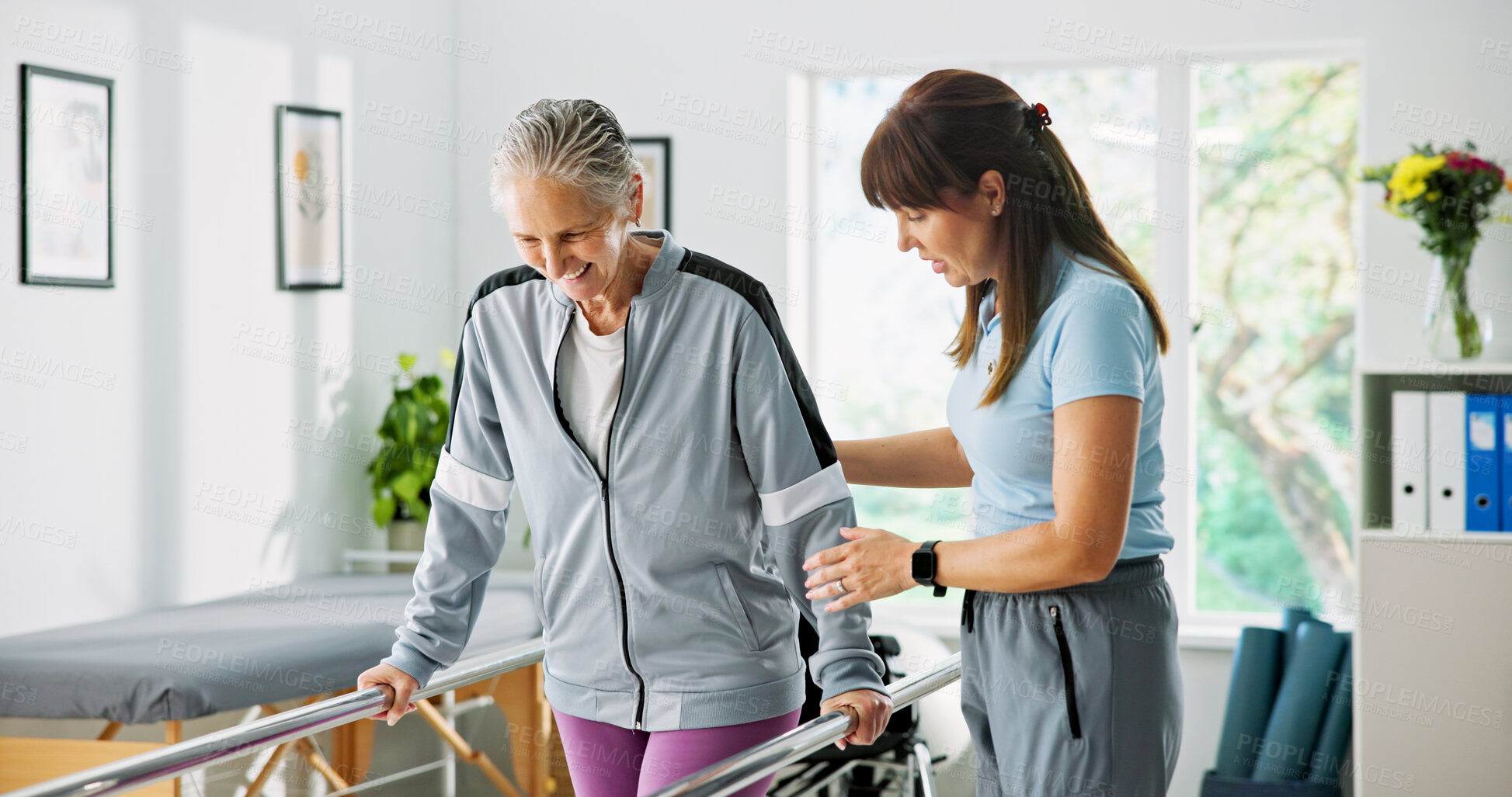 Buy stock photo Happy woman, senior patient or physiotherapist with walker rail for balance or stability in clinic. Elderly, female person or health physio with assistance for muscle recovery or movement in practice