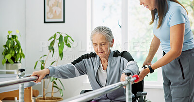 Buy stock photo Rehabilitation, stability and wheelchair with old woman in clinic for physiotherapy routine. Balance, healing and walking with physical therapist helping senior patient in health center for recovery
