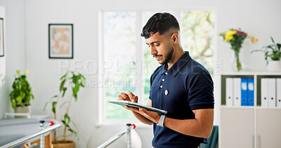 Buy stock photo Physiotherapy, tablet and reading with man in clinic for treatment plan, rehabilitation schedule and healthcare. Online medical report, physical therapy progress and diagnosis results with person