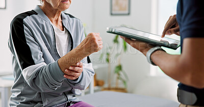 Buy stock photo Physiotherapy, tablet and hands with old woman in clinic for wrist pain, rehabilitation and discussion. Online medical report, physical therapy progress and advice with people for osteoarthritis