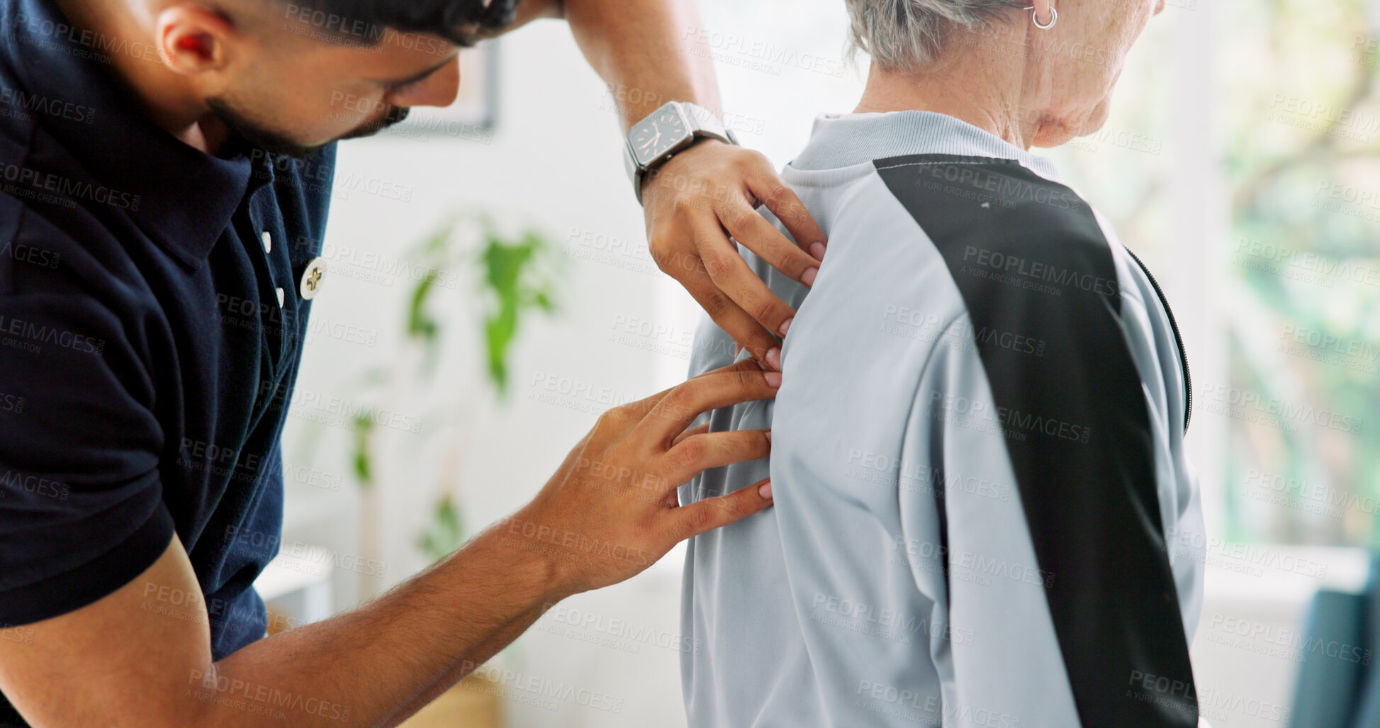 Buy stock photo Chiropractor, hands and old woman in clinic with back exam, physiotherapy massage and rehabilitation. Elderly person, physiotherapist and spine evaluation for acupressure, medical help and wellness.