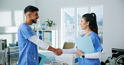 Buy stock photo People, doctors and shaking hands at clinic, happy and thanks with team for healthcare services. Man, woman and smile with handshake for success, achievement or goals with congratulations at hospital