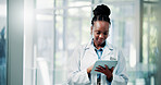 Doctor, hospital and black woman on tablet for online results, medical research and patient report. Healthcare, space and person on digital tech for telehealth, clinic diagnosis and planning surgery