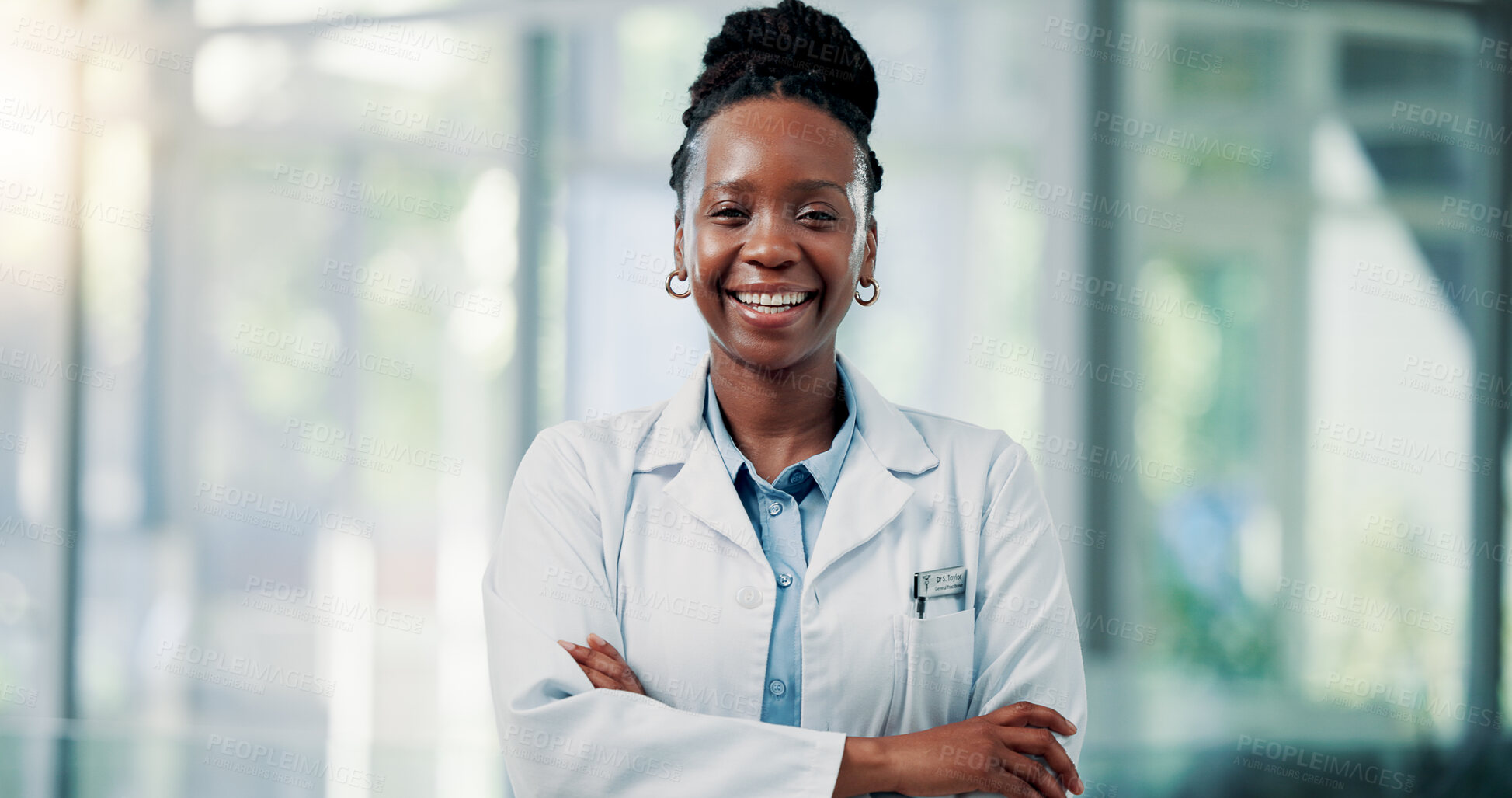 Buy stock photo Happy, black woman and portrait of doctor in hospital with confidence for medical career and support. Smile, professional and African female healthcare worker with pride for job development in clinic