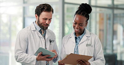 Buy stock photo Meeting, hospital and doctors on tablet and clipboard for patient results, diagnosis and medical advice. Healthcare, clinic and man and woman on digital tech for research, surgery and treatment plan